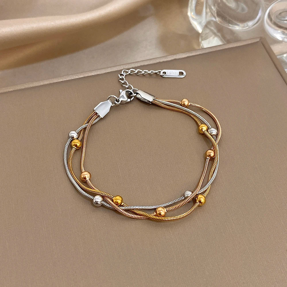 Bracelet Ajustable Multi-Rangs Perlé