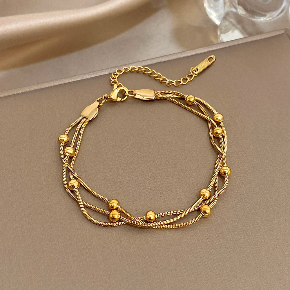 Bracelet Ajustable Multi-Rangs Perlé